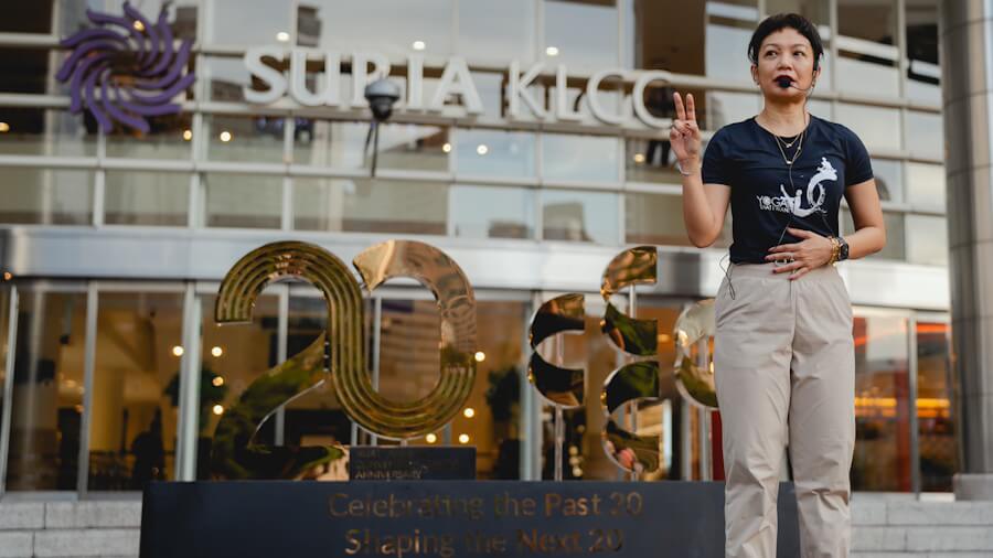 Celebrating 20 Years of Purposeful Events with Atilia Haron at a Sunrise Yoga Experience at KLCC Esplanade